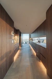Custom built cabinets in Brisbane Modern timber style kitchen with city views