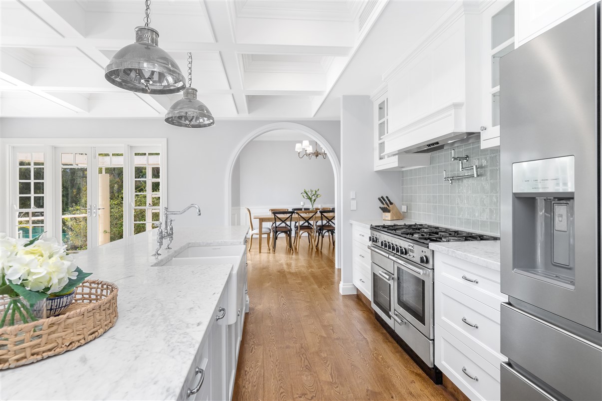 Custom Cabinetry in Brisbane | Modern Brisbane kitchen design 2025 by Dana Kitchens featuring timber and stone finishes